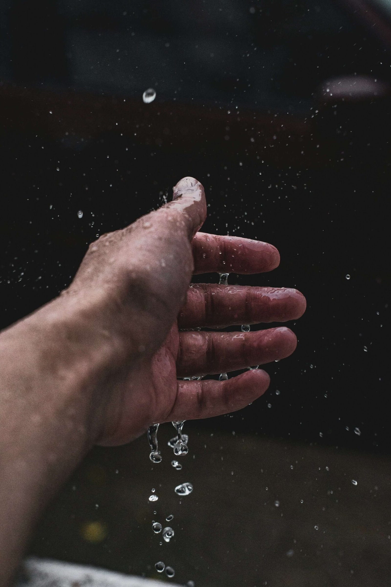 Hands trying to hold water, symbolizing effort to fix someone emotionally.