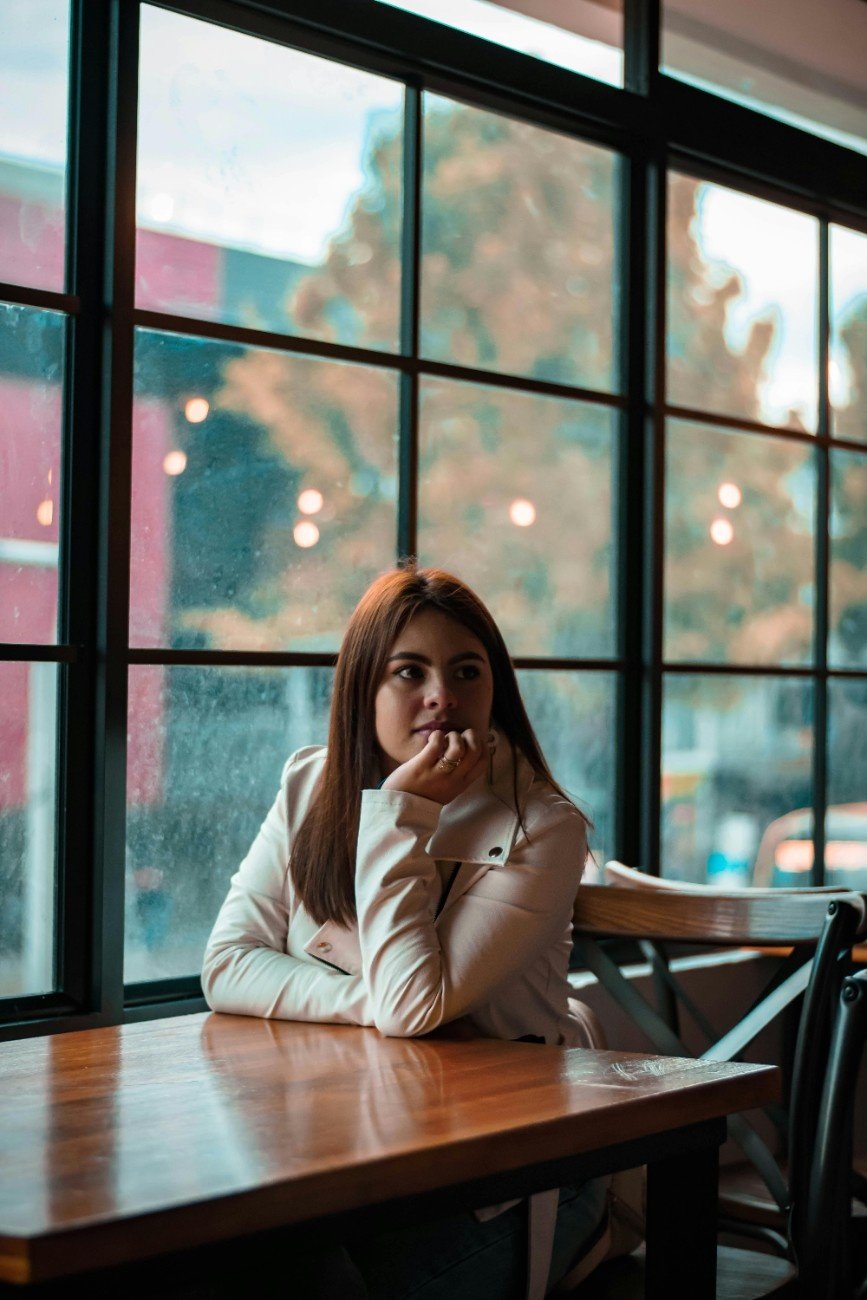 Woman sitting in a cozy café